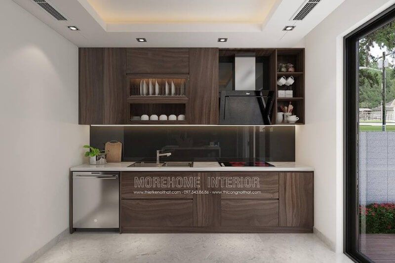 Không gian bếp hiện đại được tô điểm bởi một kính ốp bếp màu đen đẹp ấn tượng.